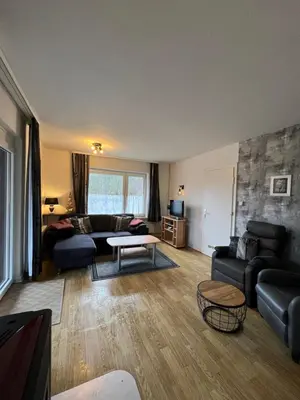 Ein Sitzbereich in der Unterkunft Ferienhaus Denise Harz