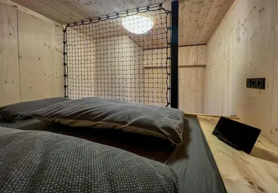 Ein Bett oder Betten in einem Zimmer der Unterkunft Experience Nature In A Loft At Treetop Height