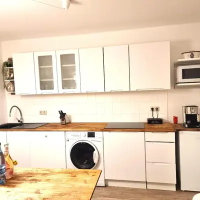 Küche/Küchenzeile in der Unterkunft Apartment am Rathaus