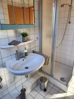 Ein Badezimmer in der Unterkunft Ferienwohnung 2 Berliner Platz