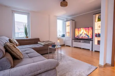TV/Unterhaltungsangebot in der Unterkunft PrimeLoft Stadtblick - stilvoll & modern - Zentrum Braunlage - bis 5 Pers - mit Parkplatz