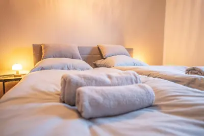 Ein Bett oder Betten in einem Zimmer der Unterkunft PrimeLoft Stadtblick - stilvoll & modern - Zentrum Braunlage - bis 5 Pers - mit Parkplatz