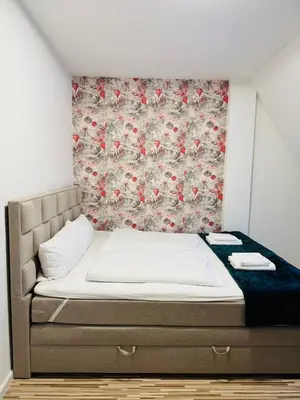 Ein Bett oder Betten in einem Zimmer der Unterkunft Magische Auszeit im Harz mit Schlossblick