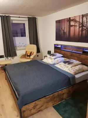 Ein Bett oder Betten in einem Zimmer der Unterkunft Haus Flora