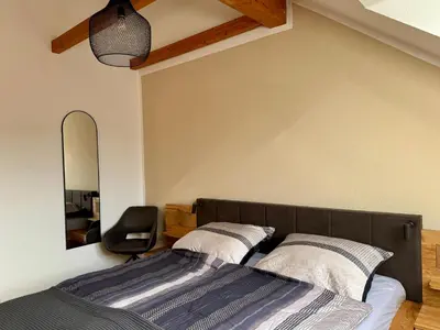 Ein Bett oder Betten in einem Zimmer der Unterkunft Ferienwohnung Gipfelblick