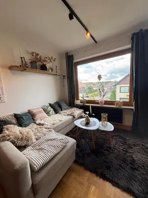 Ein Sitzbereich in der Unterkunft Brauni City Apartment