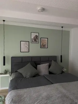 Ein Bett oder Betten in einem Zimmer der Unterkunft Ferienwohnung Domschatz