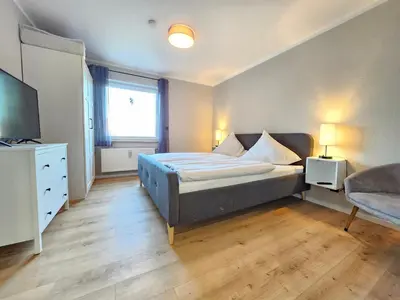 Ein Bett oder Betten in einem Zimmer der Unterkunft Ferienwohnung Gondelblick an der Seilbahn