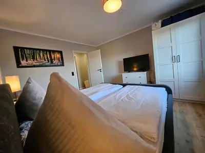Ein Bett oder Betten in einem Zimmer der Unterkunft Ferienwohnung Gondelblick an der Seilbahn