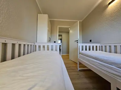 Ein Bett oder Betten in einem Zimmer der Unterkunft Ferienwohnung Gondelblick an der Seilbahn