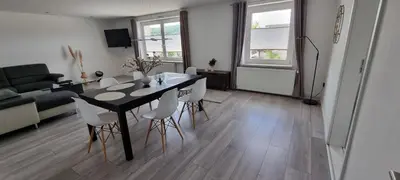Ein Sitzbereich in der Unterkunft FeWo Schloss- & Brockenblick