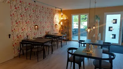 Ein Sitzbereich in der Unterkunft Hotel Bodethal