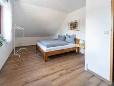Ein Bett oder Betten in einem Zimmer der Unterkunft Forest Villa with Sauna