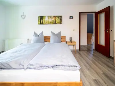 Ein Bett oder Betten in einem Zimmer der Unterkunft Forest Villa with Sauna
