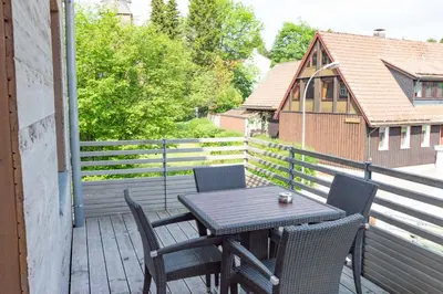 Ein Balkon oder eine Terrasse in der Unterkunft StrandBerg's Stadt Chalet