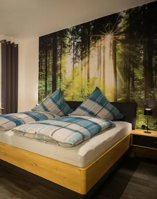 Ein Bett oder Betten in einem Zimmer der Unterkunft Ferienwohnung Busch 2