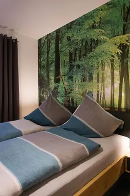 Ein Bett oder Betten in einem Zimmer der Unterkunft Ferienwohnung Busch 2