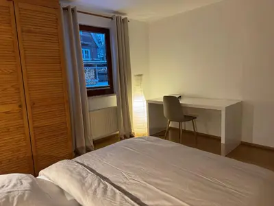 Ein Bett oder Betten in einem Zimmer der Unterkunft Schlesierweg-Apartments