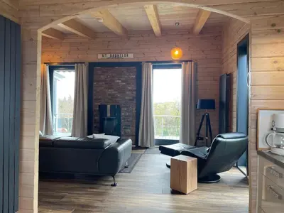 Ein Sitzbereich in der Unterkunft Blockhaus Kik im Harz