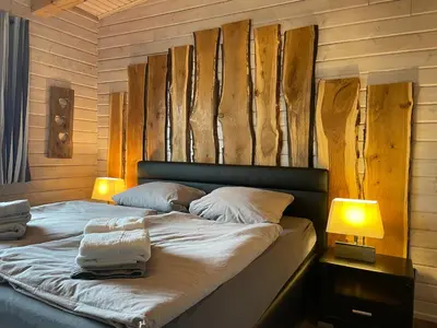 Ein Bett oder Betten in einem Zimmer der Unterkunft Blockhaus Kik im Harz