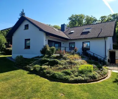Ein Garten an der Unterkunft Ferienwohnung Hanenthorp