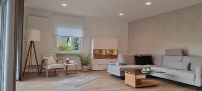 Ein Sitzbereich in der Unterkunft Ferienwohnung Hanenthorp