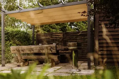 Ein Garten an der Unterkunft Waldrandzauber