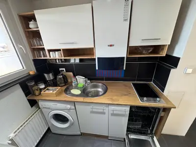 Küche/Küchenzeile in der Unterkunft FeWo Domo46 mit Balkon, Waschmaschine & Smart TV