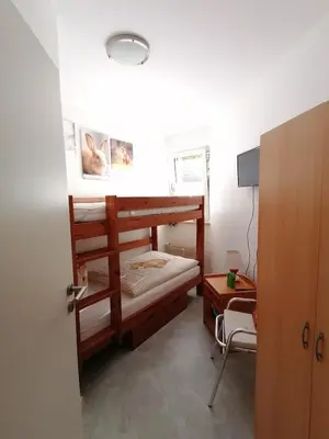 Ein Bett oder Betten in einem Zimmer der Unterkunft Ferienwohnung 'Auszeit Parkresidenz'