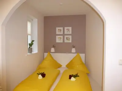 Ein Bett oder Betten in einem Zimmer der Unterkunft Ferienwohnungen Braun Goslar