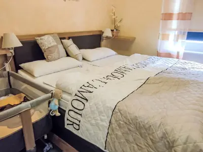 Ein Bett oder Betten in einem Zimmer der Unterkunft Apartment Bocksbergperle 1 by Interhome