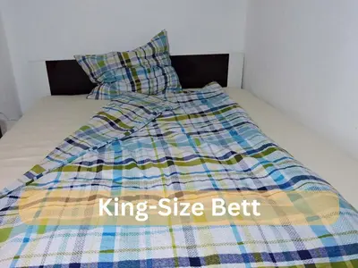 Ein Bett oder Betten in einem Zimmer der Unterkunft Business Apartment Altenau