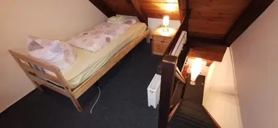 Ein Bett oder Betten in einem Zimmer der Unterkunft Ferienwohnungen Christel