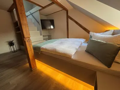 Ein Bett oder Betten in einem Zimmer der Unterkunft Stilapartment City 3