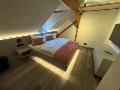 Ein Bett oder Betten in einem Zimmer der Unterkunft Stilapartment City 3