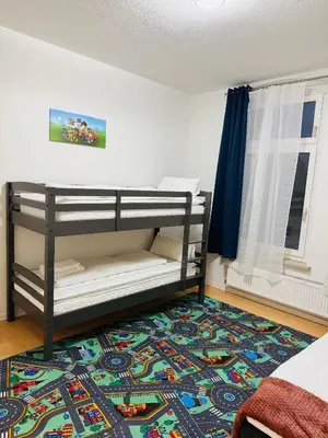 Ein Bett oder Betten in einem Zimmer der Unterkunft Familientraum im wunderschönen Harz