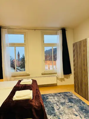 Ein Bett oder Betten in einem Zimmer der Unterkunft Familientraum im wunderschönen Harz