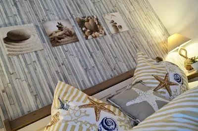Ein Bett oder Betten in einem Zimmer der Unterkunft Herzstück