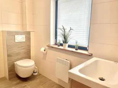 Ein Badezimmer in der Unterkunft Herzstück