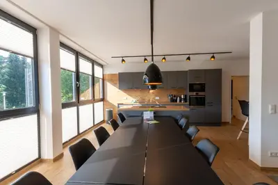 Ein Sitzbereich in der Unterkunft Ferienwohnung WurmbergQuartier mit Terrasse und Grill