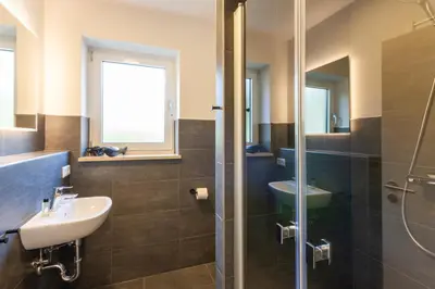 Ein Badezimmer in der Unterkunft Ferienwohnung WurmbergQuartier mit Terrasse und Grill
