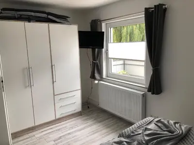 Ein Bett oder Betten in einem Zimmer der Unterkunft Ferienwohnung Wolfswiese
