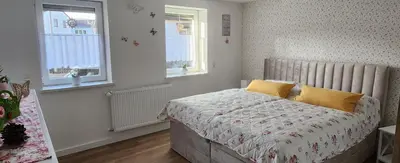 Ein Bett oder Betten in einem Zimmer der Unterkunft Fewo Harzer Leuchtturm
