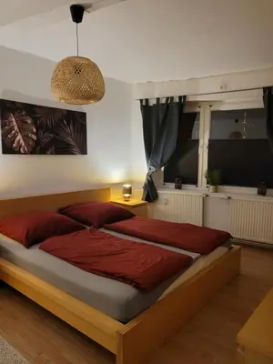 Ein Bett oder Betten in einem Zimmer der Unterkunft Ferienwohnung Langenstein