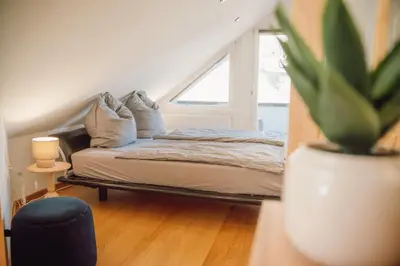 Ein Bett oder Betten in einem Zimmer der Unterkunft Helles Bergblick Luxus Apartment