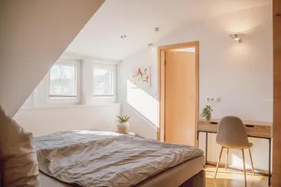 Ein Bett oder Betten in einem Zimmer der Unterkunft Helles Bergblick Luxus Apartment