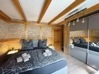 Ein Bett oder Betten in einem Zimmer der Unterkunft Am Hang