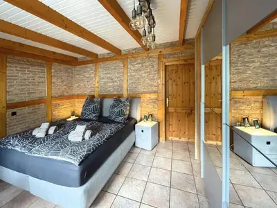 Ein Bett oder Betten in einem Zimmer der Unterkunft Am Hang