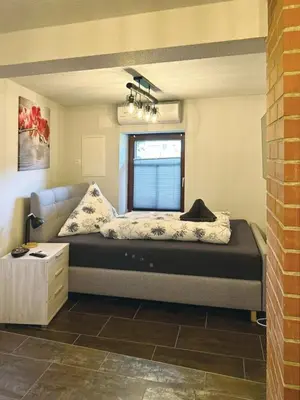 Ein Bett oder Betten in einem Zimmer der Unterkunft Nicole