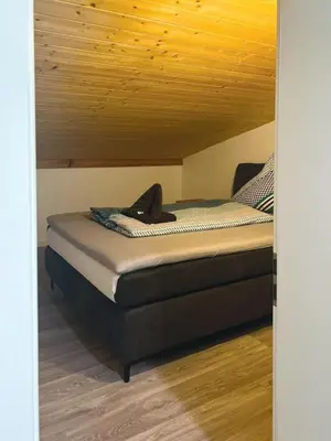 Ein Bett oder Betten in einem Zimmer der Unterkunft Nicole II